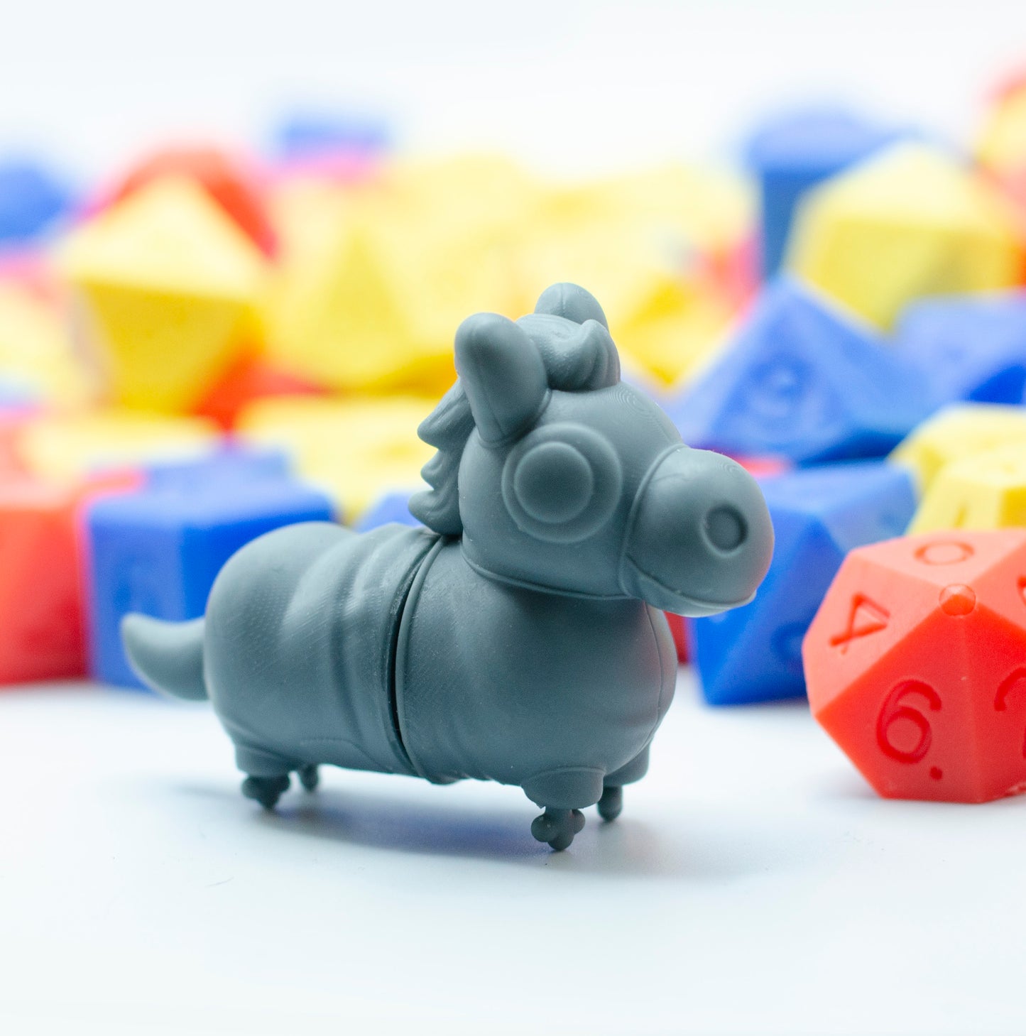 A 3d printed cartoony two-part horse costume, with little kobold feet sticking out of the bottom.