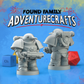 Two views of gray 3d models of the Penguin space Marine figures with weapons on a blue background, featuring 'Found Family AdventureCrafts' text.